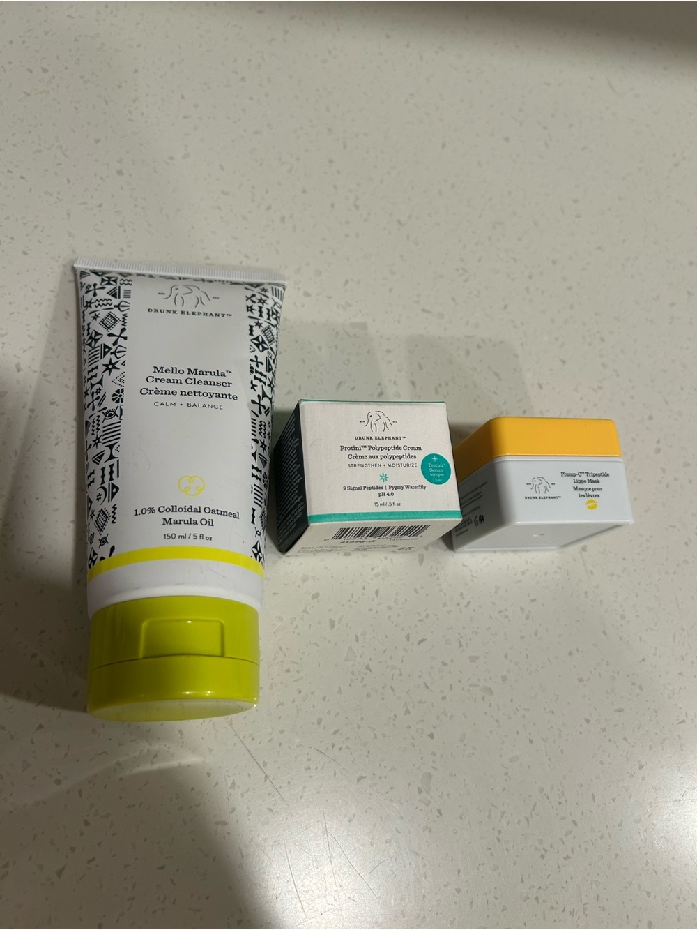 Drunk Elephant Skincare Trio with Yellow and White Packaging